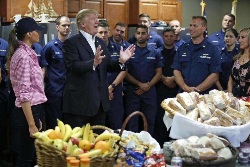 The President and the First Lady helped serve sandwiches (AP)