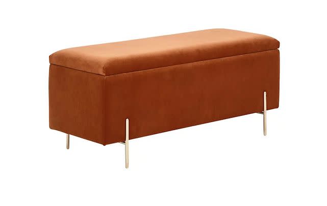 Keep spare bedsheets and towels in this gorgeous rust ottoman