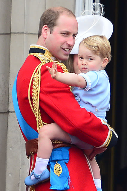 Like father, like son! Prince George made his Buckingham Palace balcony debut on Saturday, and he did it in a very special way -- the 22-month-old wore the exact outfit his dad Prince William wore when <em>he</em> made his balcony debut in 1984. <strong>PHOTOS: Prince George & Princess Charlotte's Adorable First Pics </strong> The timeless blue romper sported by both princes features off-white frill at the neckline and sleeves plus jaunty gold buttons. Prince George's first appearance on the balcony wearing the same outfit his father wore at HM's Birthday Parade 1984 pic.twitter.com/ffhrDleGmT— Kensington Palace (@KensingtonRoyal) June 13, 2015 The royal family were all together to celebrate the Trooping the Colour ceremony, an annual national military parade that celebrates Her Majesty's birthday. Prince George completely stole the show from both his grandmother -- Queen Elizabeth is celebrating her 89th birthday -- and his parents when he gave a precious wave to the adoring crowd. Splash News <strong>WATCH: Prince William & Kate Middleton Debut Baby Girl </strong> The parade also marked Kate Middleton's first public appearance since giving birth to Princess Charlotte on May 2. Mom even complemented her son in a floral-print baby blue-and-white Catherine Walker coat-dress. Splash News Even though it was a major day in Britain, Prince George didn't seem a bit overwhelmed by all of the spectacle and attention. He really is taking after his royal parents!