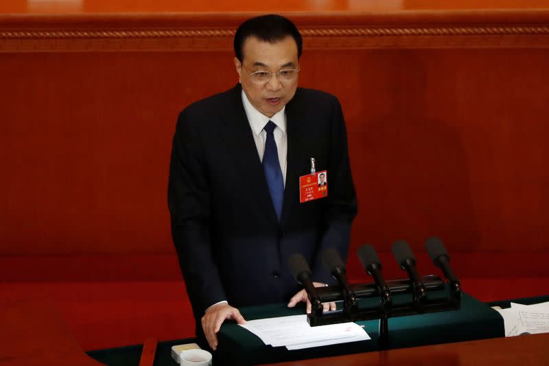 Chinese Premier Li Keqiang delivers a speech at the opening session of NPC in Beijing