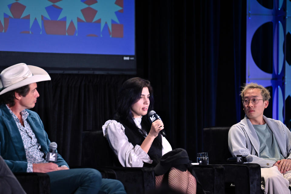 From left: Kimbal Musk, Nadezhda Tolokonnikova, and Alex Zhang speak about 'Move Over NFTs, Here Come the DAOs' during the 2022 SXSW Conference and Festivals at Austin Convention Center on 14 March 14, in Texas. Photo: Chris Saucedo/Getty for SXSW