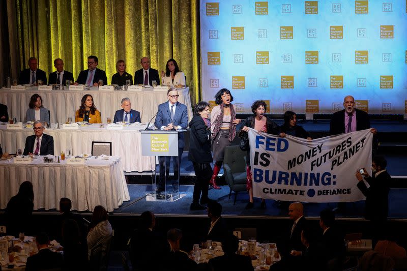 Members of Climate Activist disrupt the a meeting of the Economic Club of New York prior to a speech by Federal Reserve Chairman Jerome Powell in New York City