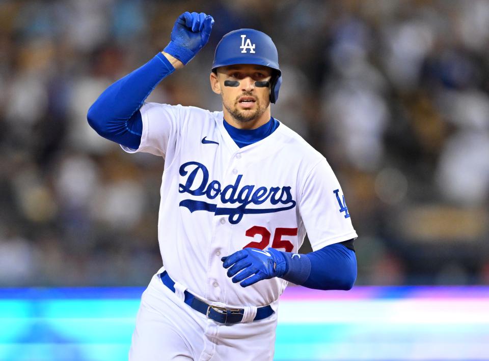 Sep 4, 2022; Los Angeles, California, USA;  Los Angeles Dodgers right fielder Trayce Thompson (25) rounds the bases after hitting a pinch hit three run home run in the seventh inning against the San Diego Padres at Dodger Stadium.