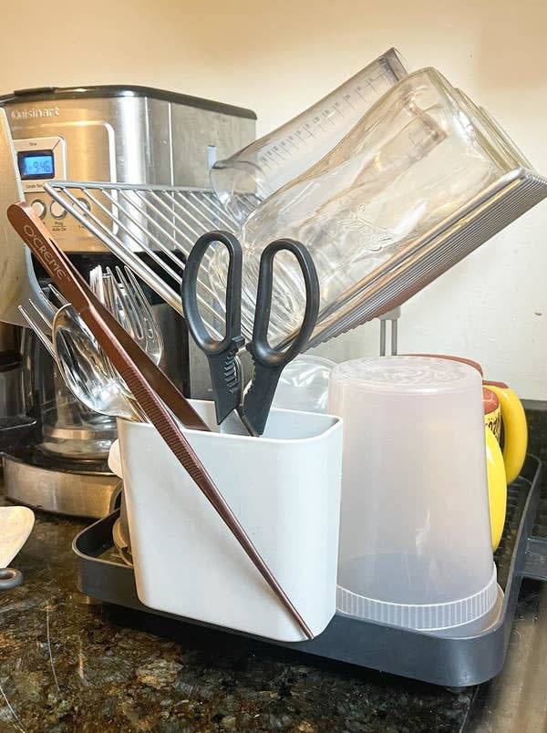 y-shaped dish rack holding a variety of items