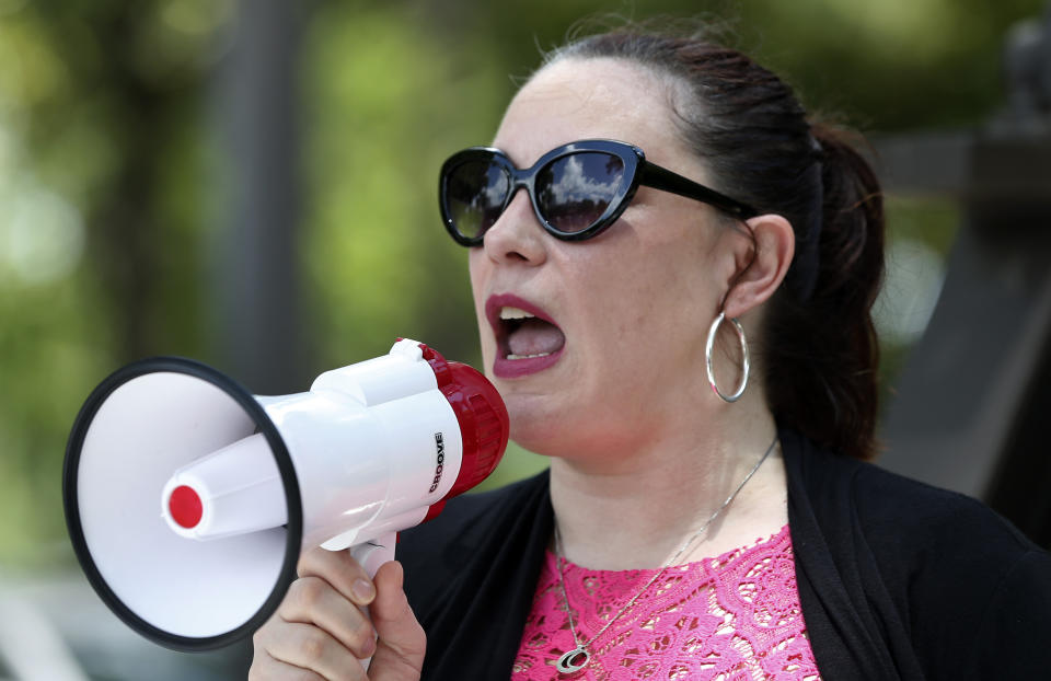 Felicia Brown-Williams, Mississippi state director for Planned Parenthood Southeast Advocates, addresses abortion rights advocate, Tuesday, May 21, 2019, at the Capitol in Jackson, Miss., as they rally to voice their opposition to state legislatures passing abortion bans. (AP Photo/Rogelio V. Solis)