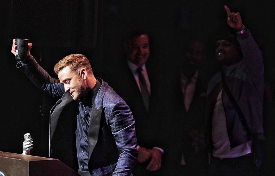 With Tonight Show host Jimmy Fallon and DJ Paul waiting in the wings, singer and actor Justin Timberlake toasts Memphis during his induction into the Memphis Music Hall of Fame on Oct. 17, 2015, during a ceremony at the Cannon Center.