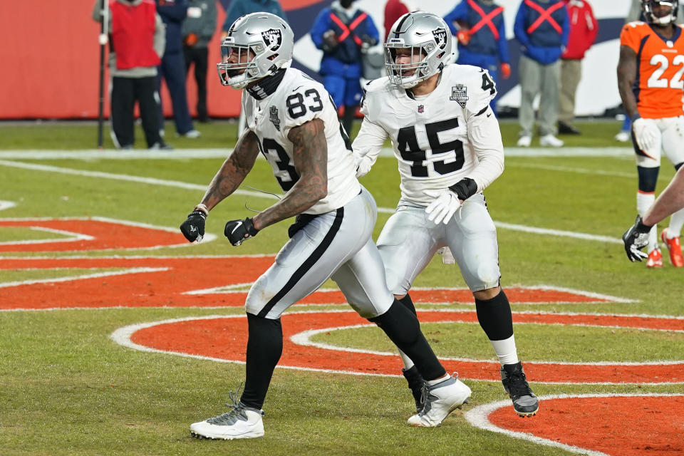 Las Vegas Raiders tight end Darren Waller (83) celebrates after making a catch for a 2-point conversion against the Denver Broncos during the second half of an NFL football game, Sunday, Jan. 3, 2021, in Denver. (AP Photo/David Zalubowski)