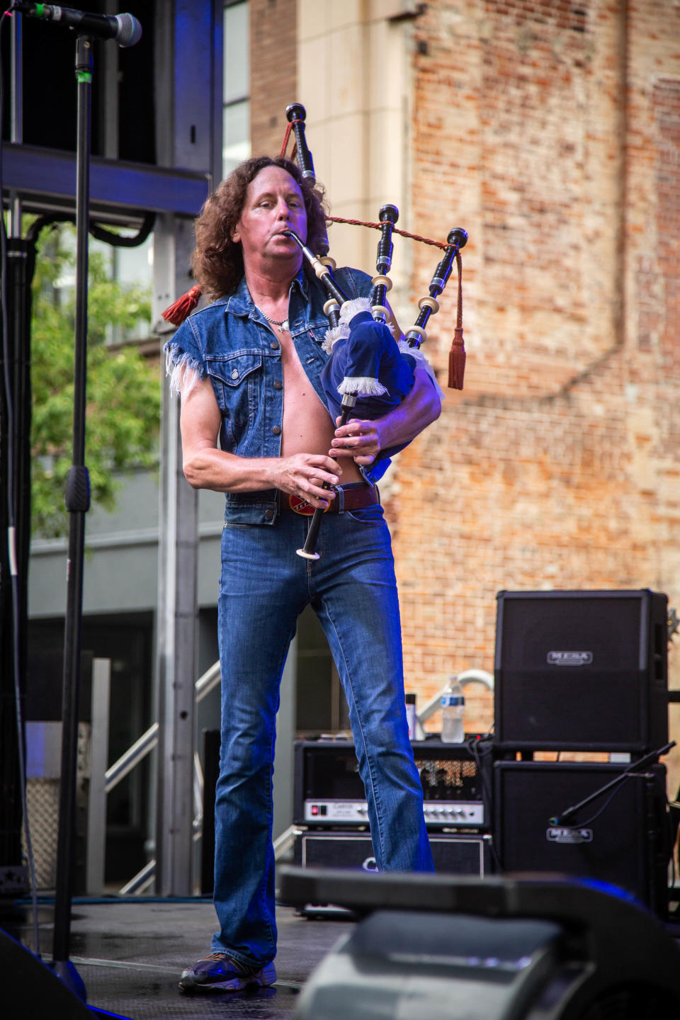 The weather held out and the Dirty Deeds- XTreme AC/DC Tribute band rocked downtown Coshocton in front of a jam-packed court square on Friday night for the second concert of the summer series presented by Our Town Coshocton and the City of Coshocton.