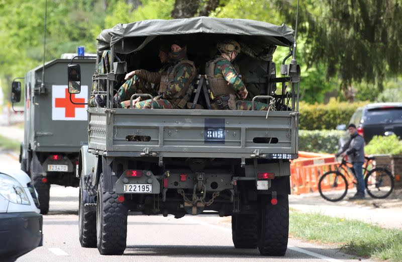 Manhunt for a Belgian soldier who threatened a virologist, in Maasmechelen