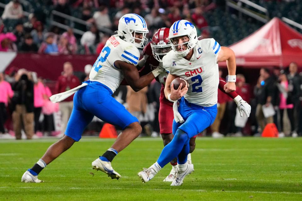 Oct 20, 2023; Philadelphia, Pennsylvania, USA; SMU Mustangs quarterback Preston Stone (2) runs with the ball against the Temple Owls during the first half at Lincoln Financial Field. Mandatory Credit: Gregory Fisher-USA TODAY Sports