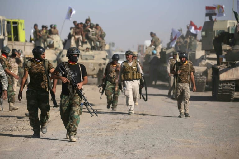 Iraqi government forces supported by fighters from the Abbas Brigade of the Hashed al-Shaabi paramilitary group advance towards Tal Afar