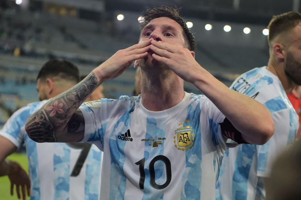 Argentina's Lionel Messi blows a kiss to fans as he celebrates after winning the Conmebol 2021 Copa America football tournament final match against Brazil at Maracana Stadium in Rio de Janeiro, Brazil, on July 10, 2021. - Argentina won 1-0. (Photo by CARL DE SOUZA / AFP) (Photo by CARL DE SOUZA/AFP via Getty Images)