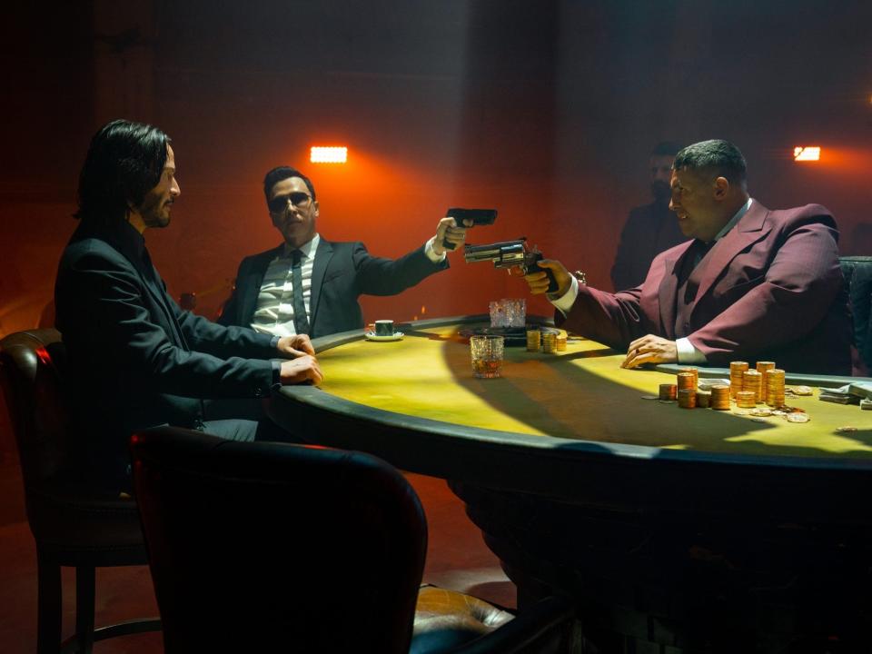 Keanu Reeves as John Wick, Donnie Yen as Caine, and Scott Adkins as Killa.