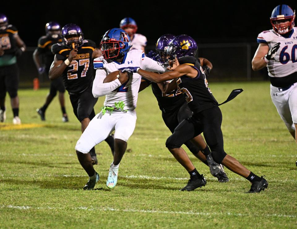 The Boynton Beach football team competes against King's Academy in the first round of the 2022 high school football playoffs in Boynton Beach. The Bengals Tigers picked up a historic 29-26 win on Nov. 14, 2022.