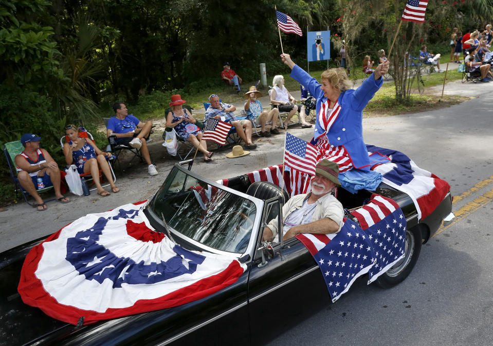 <p>Decked out in full American flag decor this “float” makes its way down Tuscawilla Road during the annual Fourth of July Parade, in Micanopy, Fla., Tuesday, July 4, 2017. (Photo: Brad McClenny/The Gainesville Sun via AP) </p>