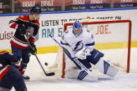 Tampa Bay Lightning goaltender Andrei Vasilevskiy (88) saves a shot on goal during the first period of an NHL hockey game against the Florida Panthers, Saturday, May 8, 2021, in Sunrise, Fla. (AP Photo/Mary Holt)