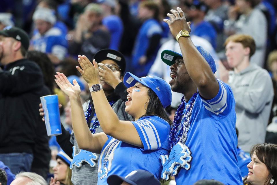 Detroit Lions fans cheer for a play against the Denver Broncos during the second half at Ford Field in Detroit on Saturday, Dec. 16, 2023.