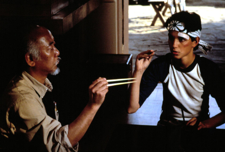 THE KARATE KID, Pat Morita, Ralph Macchio, 1984. ©Columbia Pictures/Courtesy Everett Collection