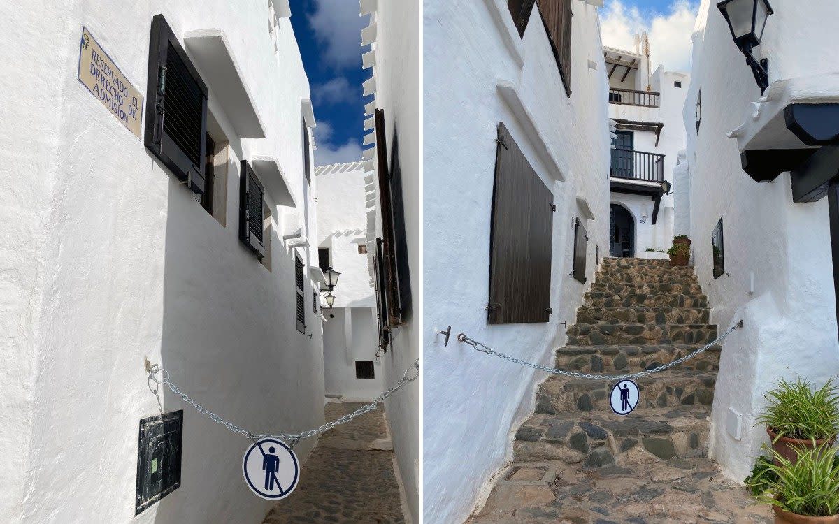 Residents of Binibeca Vell, in Menorca have put up chains to keep visitors out before 11am and after 8pm