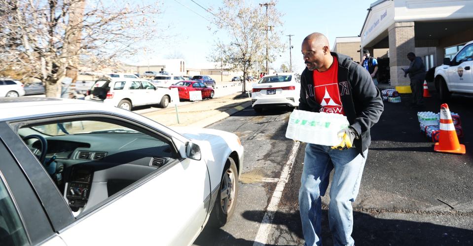 MLGW workers distribute water to customers at First Baptist Church Broad, 2835 Broad Avenue on Dec. 28, 2022 in Memphis