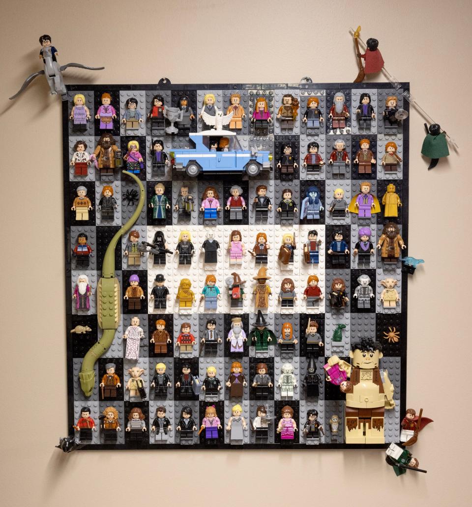 A display board holds the Lego version of characters from "Harry Potter" in Scott Brown's Plain Township basement.