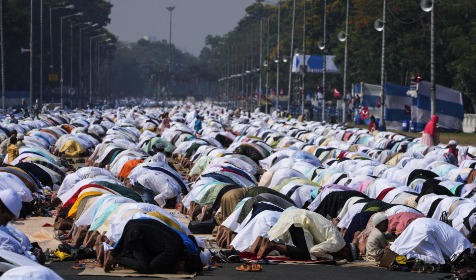 FILE - Muslims offer Eid al-Fitr prayers in Kolkata, India, Saturday, April 22, 2023. Eid al-Fitr marks the end of the fasting month of Ramadan. The nones in India come from an array of belief backgrounds, including Hindu, Muslim and Sikh. The surge of Hindu nationalism has shrunk the space for the nones over the last decade, activists say. (AP Photo/Bikas Das, File)