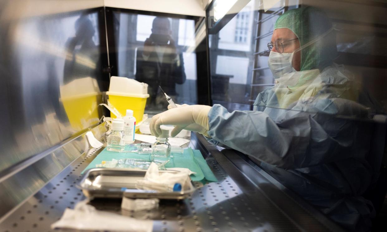 <span>A doctor preparing phages at a hospital in Lyon. Phages – viruses that parasitise bacteria – may be a way to fight AMR bacteria, which killed 1.14 million people in 2021.</span><span>Photograph: AFP</span>