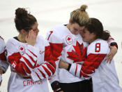 <p>Rebecca Johnston, Laura Stacey and Canada defenseman Laura Fortino (8) await their medals as Canada loses in a shootout to the United States in the Olympic women’s hockey gold medal game at the Gangneung Hockey Centre in Gangneung in Pyeongchang in South Korea. February 22, 2018. (Steve Russell/Toronto Star via Getty Images) </p>