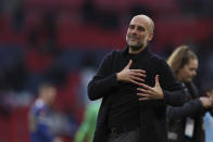 Manchester City's head coach Pep Guardiola celebrates on full time of the English FA Cup semifinal soccer match between Manchester City and Chelsea at Wembley stadium in London, Saturday, April 20, 2024. Manchester City won 1-0. (AP Photo/Ian Walton)