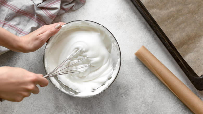 Person whisking egg whites