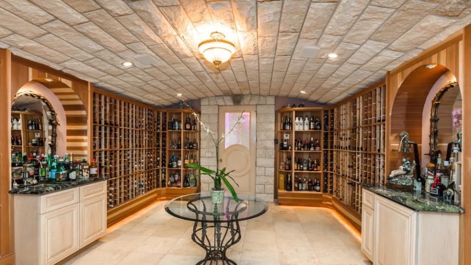 The limestone-clad wine cellar houses up to 2,500 bottles. - Credit: Scott Thompson