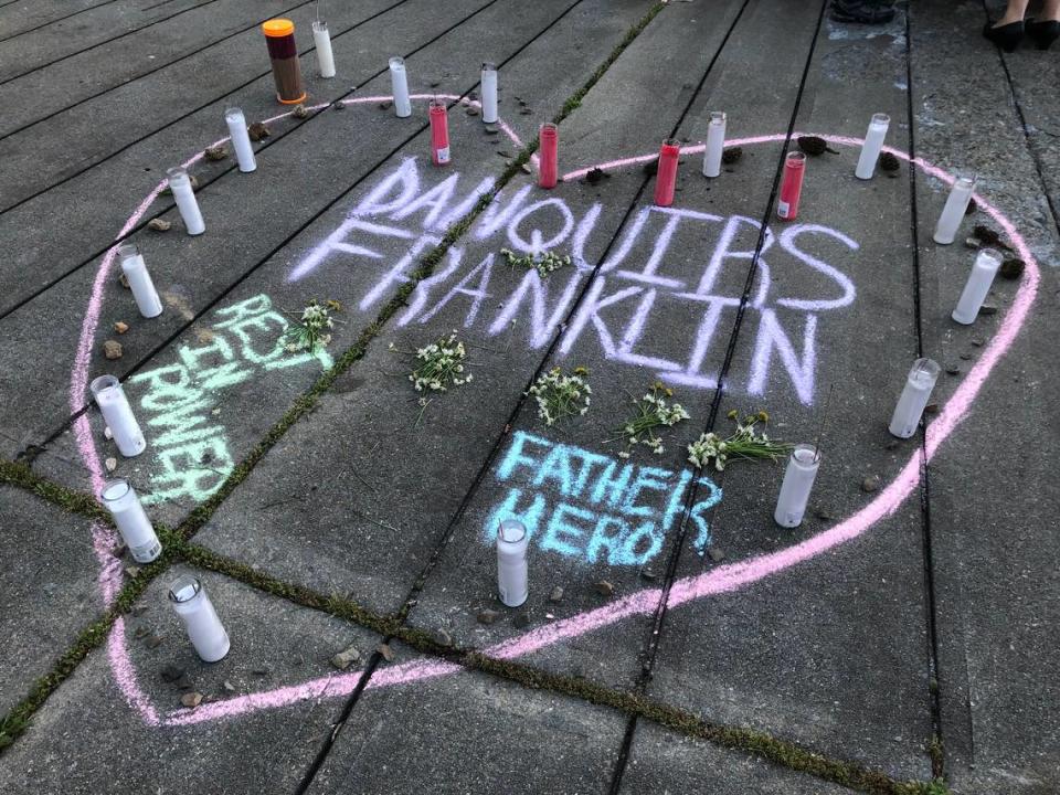 A sign drawn in chalk at a rally in Marshall Park for Danquirs Franklin, who was shot and killed by Charlotte Mecklenburg Police on March 25, 2019.