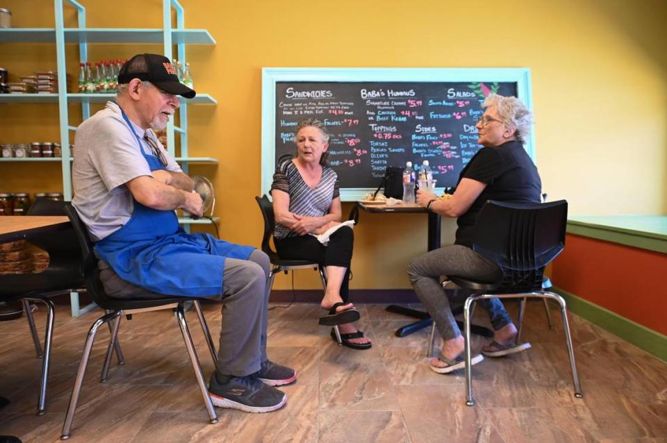 Chef Yahia Kamal, left, of Baba’s Pantry. The Palestinian American deli was recently named one of the best new restaurants of 2023 by Southern Living magazine.