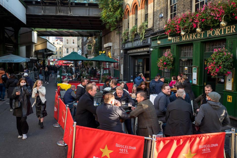 Ministers are also under growing pressure to review the 'hard' 10pm curfew on pubs (AFP via Getty Images)