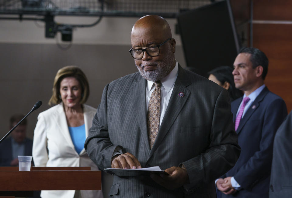 FILE - In this July 1, 2021, file photo Rep. Bennie Thompson, chairman of the House Homeland Security Committee, flanked by Speaker of the House Nancy Pelosi, D-Calif., left, and Rep. Pete Aguilar, D-Calif., finishes his remarks as Pelosi announces her appointments to a new select committee to investigate the violent Jan. 6 insurrection at the Capitol, on Capitol Hill in Washington. (AP Photo/J. Scott Applewhite, File)