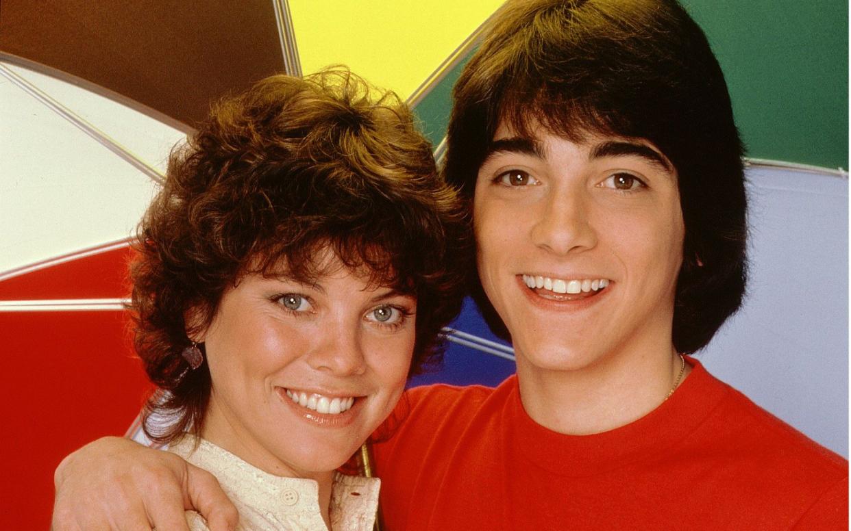 Happier days: the late Erin Moran opposite her on-screen love interest Scott Baio in 1982 - Rex Features