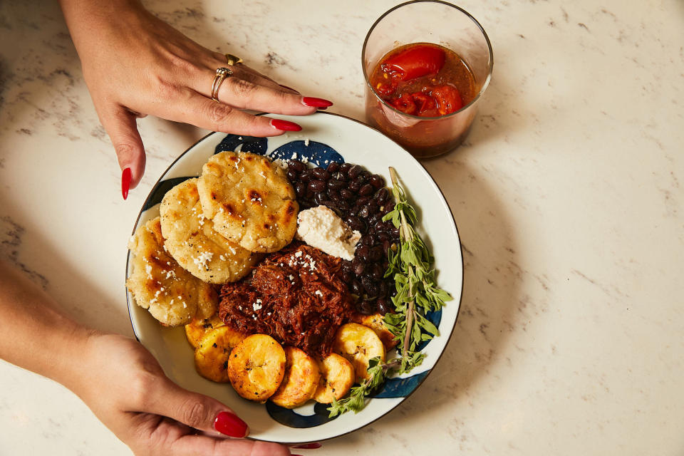 Stott's dish of pulled bison stew, maduras, stewed black beans, arepas and farmers cheese. (Colin Clark for TODAY)