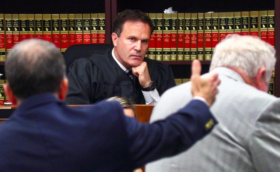 Superior Court Judge John Martin, center, listens Thursday morning to an argument from Assistant District Attorney Peter Hoffman, left, during the trial of Lydell Maynard “Trapa” Sparks. Sparks is being represented by Mike Garner, right. 06/16/2022 Mike Haskey/mhaskey@ledger-enquirer.com