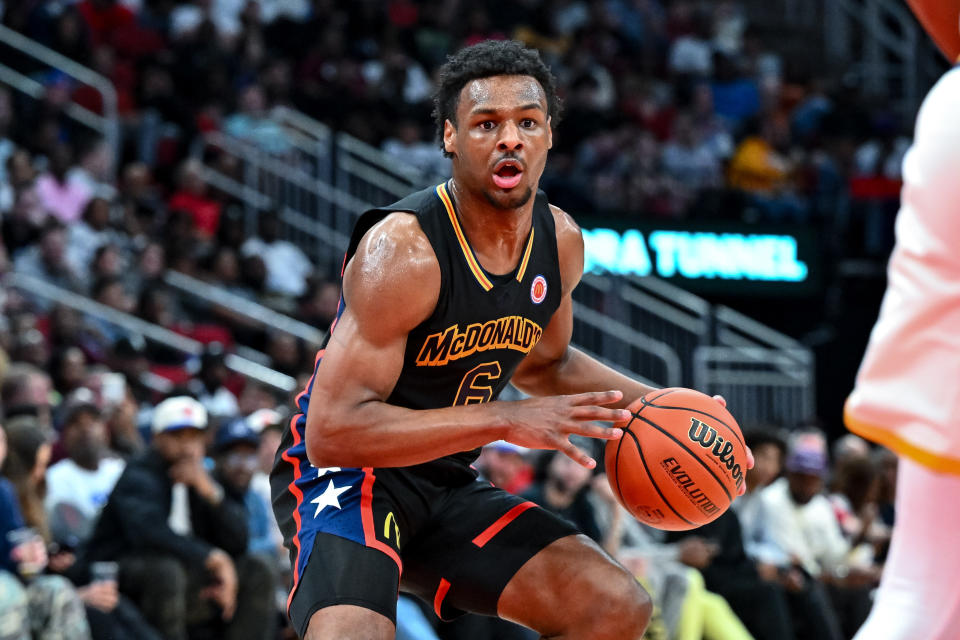 Mar 28, 2023; Houston, TX, USA; McDonald’s All American West guard Bronny James (6) controls the ball during the first half against the McDonald’s All American East at Toyota Center. Mandatory Credit: Maria Lysaker-USA TODAY Sports