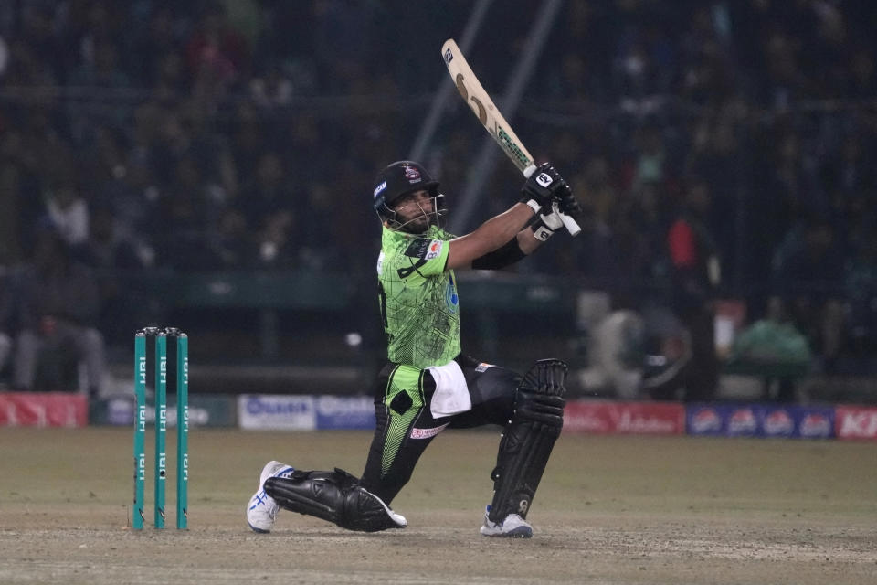 Lahore Qalandars' Sahibzada Farhan follows the ball after playing a shot for boundary during the Pakistan Super League T20 cricket match between Lahore Qalandars and Karachi Kings, in Lahore, Pakistan Saturday, Feb. 24, 2024. (AP Photo/K.M. Chaudary)