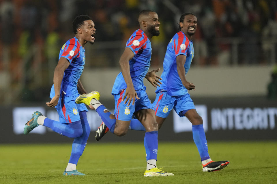 DR Congo players celebrate after goalkeeper Lionel Mpasi scored the winning goal in a penalty shootout winning 8-7 during the African Cup of Nations Round of 16 soccer match between Egypt and DR Congo, at the Laurent Pokou stadium in San Pedro, Ivory Coast, Sunday, Jan. 28, 2024. 2024. (AP Photo/Sunday Alamba)