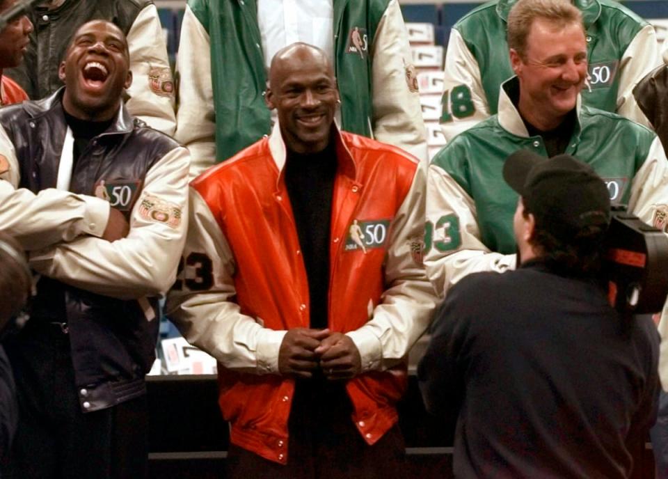 Magic Johnson with Michael Jordan in the 1990s (AP)