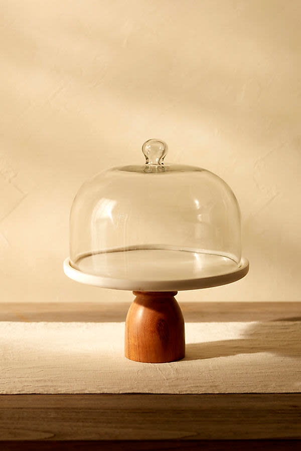 <p><a href="https://go.redirectingat.com?id=74968X1596630&url=https%3A%2F%2Fwww.anthropologie.com%2Fshop%2Fmarble-wood-cake-stand&sref=https%3A%2F%2Fwww.housebeautiful.com%2Fshopping%2Fg60630997%2Fgifts-for-bakers%2F" rel="nofollow noopener" target="_blank" data-ylk="slk:Shop Now;elm:context_link;itc:0;sec:content-canvas" class="link ">Shop Now</a></p><p>Marble + Wood Cake Stand</p><p>anthropologie.com</p><p>$158.00</p>