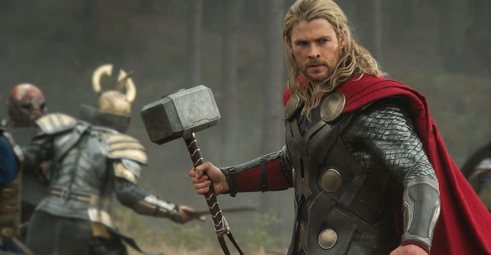 Thor holds Mjolnir in battle