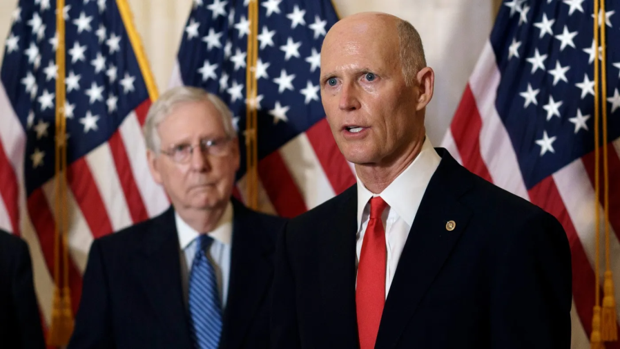 Sen. Rick Scott (R-Fla.) joined at left by Senate Republican Leader Mitch McConnell (Ky.) speaks to reporters briefly following a closed-door meeting where the republican conference held leadership elections on Capitol Hill on Nov. 10, 2020. Scott was selected to be chairman of the National Republican Senatorial Committee, the campaign arm for Senate races. <em>(AP Photo/J. Scott Applewhite)</em>