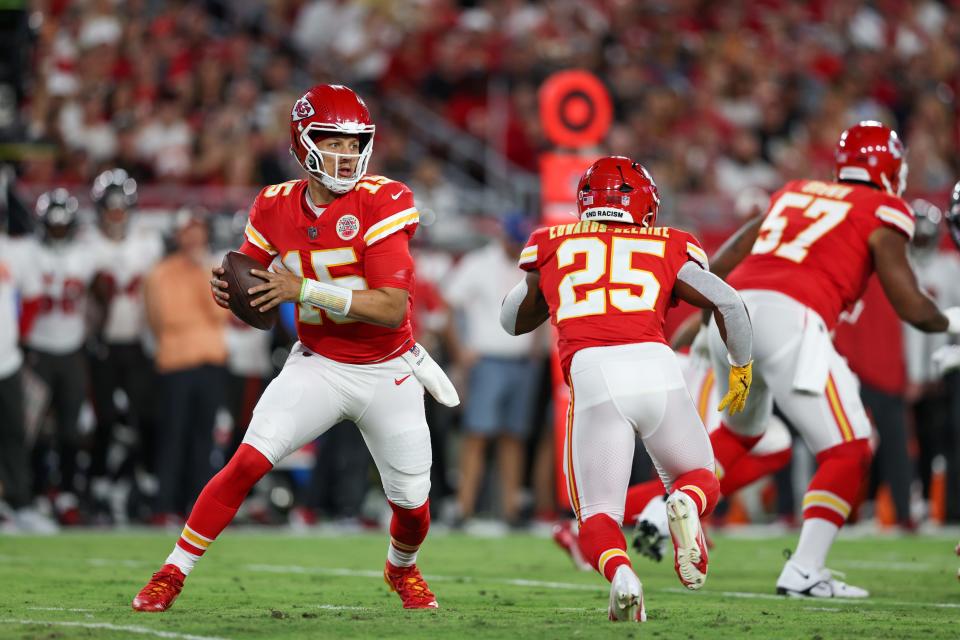 Oct 2, 2022; Tampa, Florida, USA; Kansas City Chiefs quarterback Patrick Mahomes (15) drops back to pass against the Tampa Bay Buccaneers in the first quarter at Raymond James Stadium. Mandatory Credit: Nathan Ray Seebeck-USA TODAY Sports