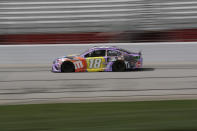 Kyle Busch (18) drives during a NASCAR Cup Series auto race at Atlanta Motor Speedway, Sunday, June 7, 2020, in Hampton, Ga. (AP Photo/Brynn Anderson)