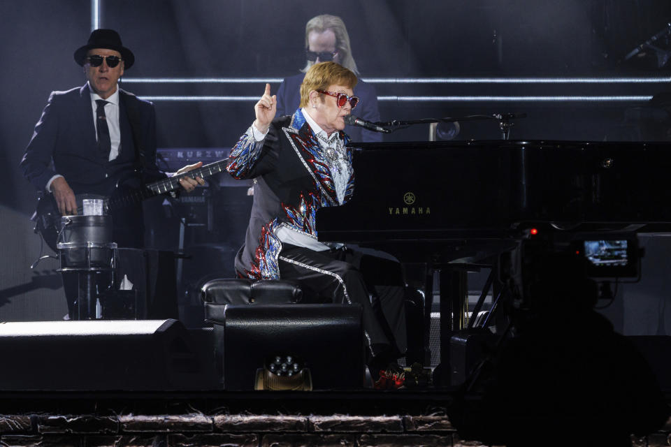 Sir Elton John performs live at the Elton John's final North American show of his "Farewell Yellow Brick Road" tour on Sunday, Nov. 20, 2022, at the Dodger Stadium in Los Angeles. (Photo by Willy Sanjuan/Invision/AP)