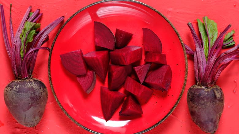 beets on red background