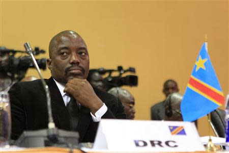 The Democratic Republic of Congo's President Joseph Kabila attends the extraordinary summit of the International Conference on the Great Lakes Region (ICGLR) head of states emergency summit in Uganda's capital Kampala September 5, 2013. REUTERS/James Akena